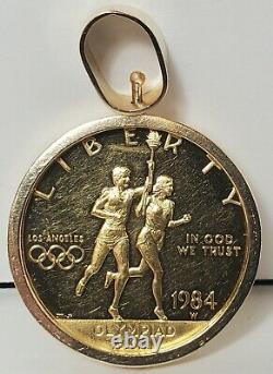 1984-W Proof Olympic Commemorative $10 Gold Coin with 14k Gold Bezel
