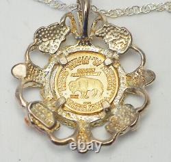 Black Hills Gold commemorative 10k gold coin sterling silver setting necklace