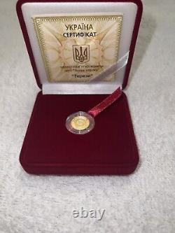 Commemorative gift gold coin Libra in a case. Certificate with 3 signature