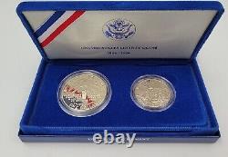 1986 Demi-dollar et Dollar de la Monnaie de l'US Mint Liberty - Immigrants & Ellis Island