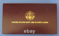 1988 US Mint Jeux Olympiques Pièces Commémoratives UNC. Ensemble de 2 pièces en or de 5 $ et en argent de 1 $.