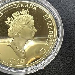2002 Pièce d'or holographique Canada de 150 $ pour l'année du cheval lunaire avec son emballage d'origine. 2855 onces troy.