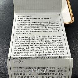 2002 Pièce d'or holographique Canada de 150 $ pour l'année du cheval lunaire avec son emballage d'origine. 2855 onces troy.