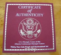 Ensemble commémoratif de 32 pièces en or et en argent des Jeux Olympiques d'Atlanta 1995-1996, avec boîte en bois et clé.