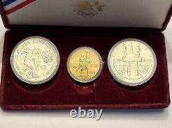 Ensemble commémoratif de 3 pièces de monnaie olympiques de 1983-1984 avec une pièce d'or de 10 $ et 2 dollars en argent