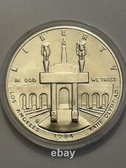 Ensemble commémoratif de 3 pièces de monnaie olympiques de 1983-1984 avec une pièce d'or de 10 $ et 2 dollars en argent