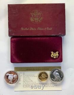 Ensemble commémoratif de 3 pièces des Jeux Olympiques de la Monnaie des États-Unis de Los Angeles 1984 avec preuve en or de 48 oz et 2 preuves en argent.
