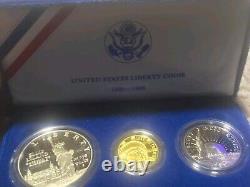 Ensemble de pièces Liberty des États-Unis de 1986 - Pièce en or de 5 $, pièce en argent de 1 $ et pièce en argent de 0,5 $ avec certificat d'authenticité et boîte
