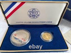 Ensemble de pièces de monnaie U. S. Mint de la Constitution de 1987, comprenant un dollar en argent et un dollar en or.