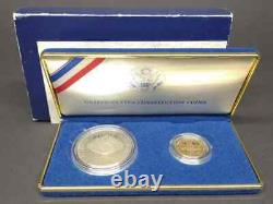 Ensemble de pièces de monnaie commémoratives de la Constitution des États-Unis de 1987 : pièce d'argent de 1 dollar et pièce d'or de 5 dollars avec certificat d'authenticité et étui.