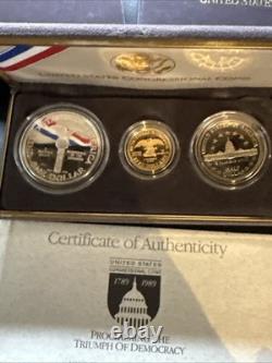 Ensemble de pièces de preuve commémoratives du Congrès américain de 1989 : 5 $ en or, 1 $ en argent, 50 cents