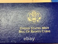 Ensemble de preuves en or de 3 pièces de la Déclaration des Droits de 1993, boîte bleue avec lettres dorées et certificat d'authenticité.