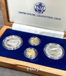 Ensemble de quatre pièces de monnaie de la Constitution des États-Unis de 1987 : 2 dollars en argent, 2 preuves en or de 5 dollars.