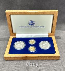 Ensemble de quatre pièces de monnaie de la Constitution des États-Unis de 1987 : 2 dollars en argent, 2 preuves en or de 5 dollars.