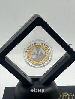 Pièce bi-métallique en or et platine de la bibliothèque du Congrès de 10 $ de 2000-W, avec boîte, sans certificat d'authenticité.