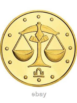 Pièce en or commémorative Libra dans un écrin. Certificat avec 3 signatures