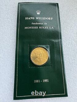 ROLEX, HANS WILSDORF PIECE Monnaie fine, pièce commémorative en or jaune 22K, montée dans un