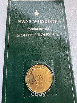 ROLEX, HANS WILSDORF PIECE Monnaie fine, pièce commémorative en or jaune 22K, montée dans un