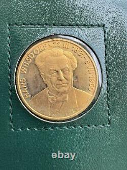 ROLEX, HANS WILSDORF PIECE Monnaie fine, pièce commémorative en or jaune 22K, montée dans un